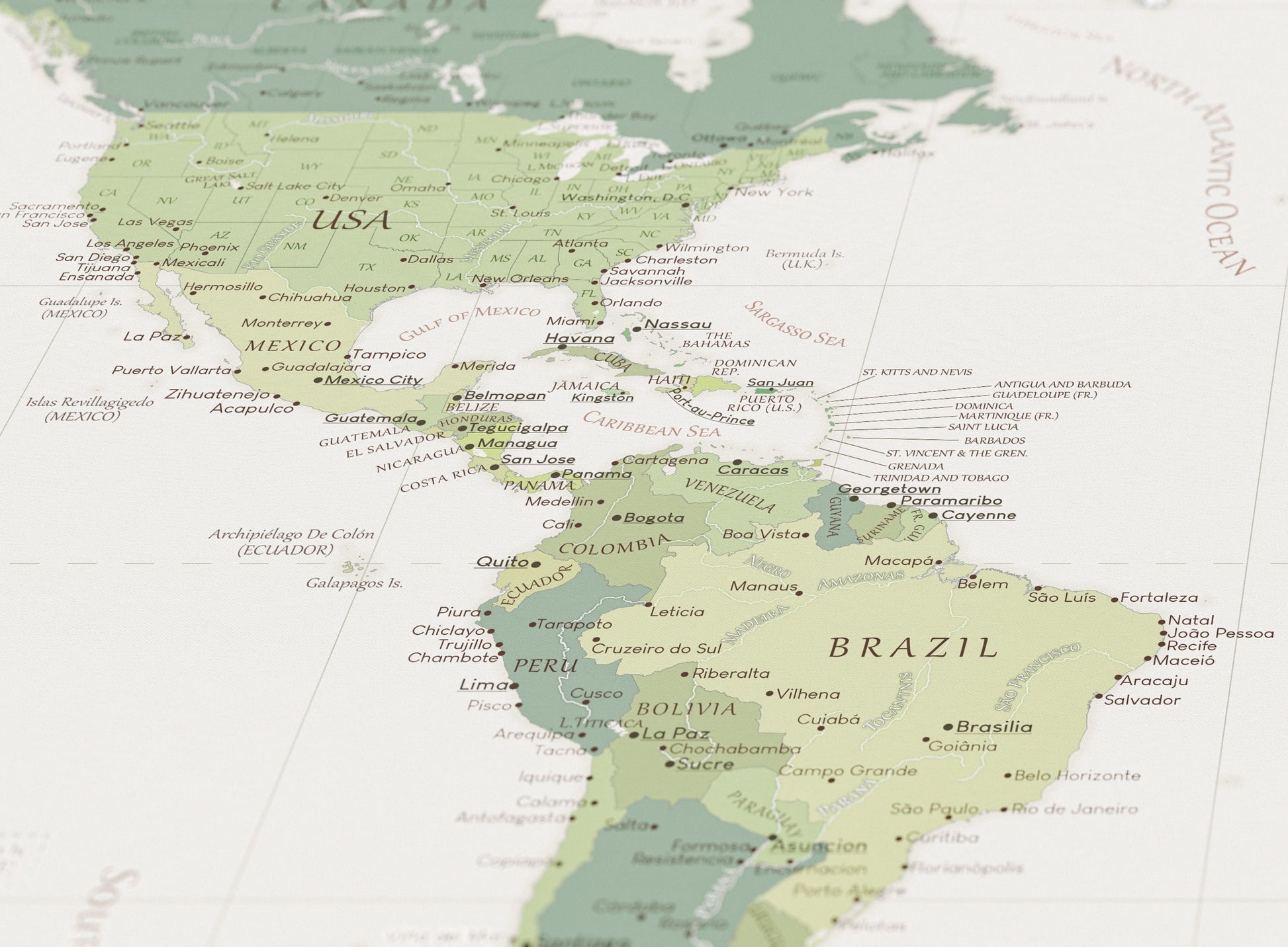 Detailed close-up of a customizable travel map with North America and South America.