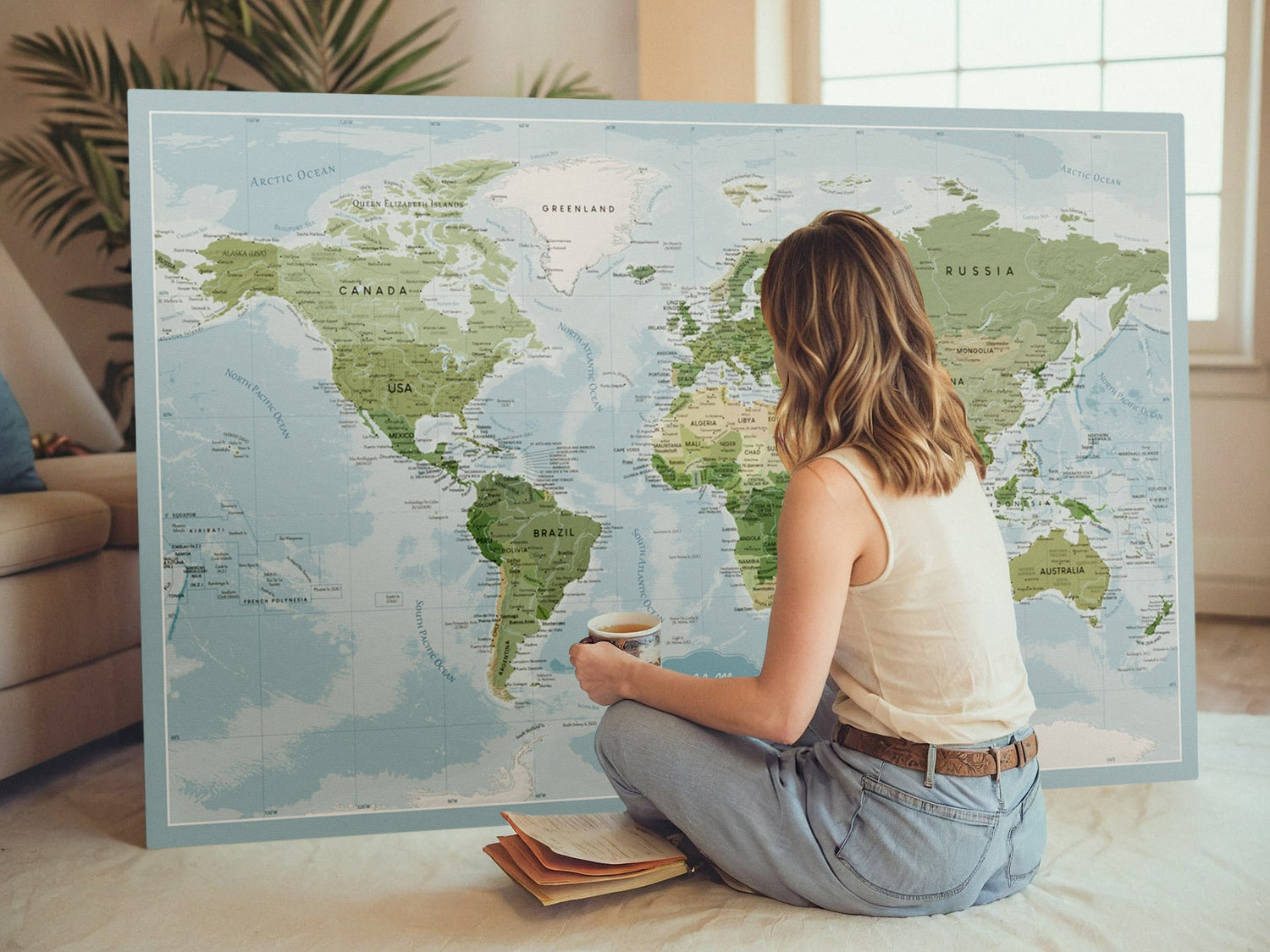 Large push pin world map canvas pinboard displayed in a living room, featuring a detailed map of the world with labeled countries, cities, and oceans. Perfect for travelers to track their travels and mark visited destinations with pins